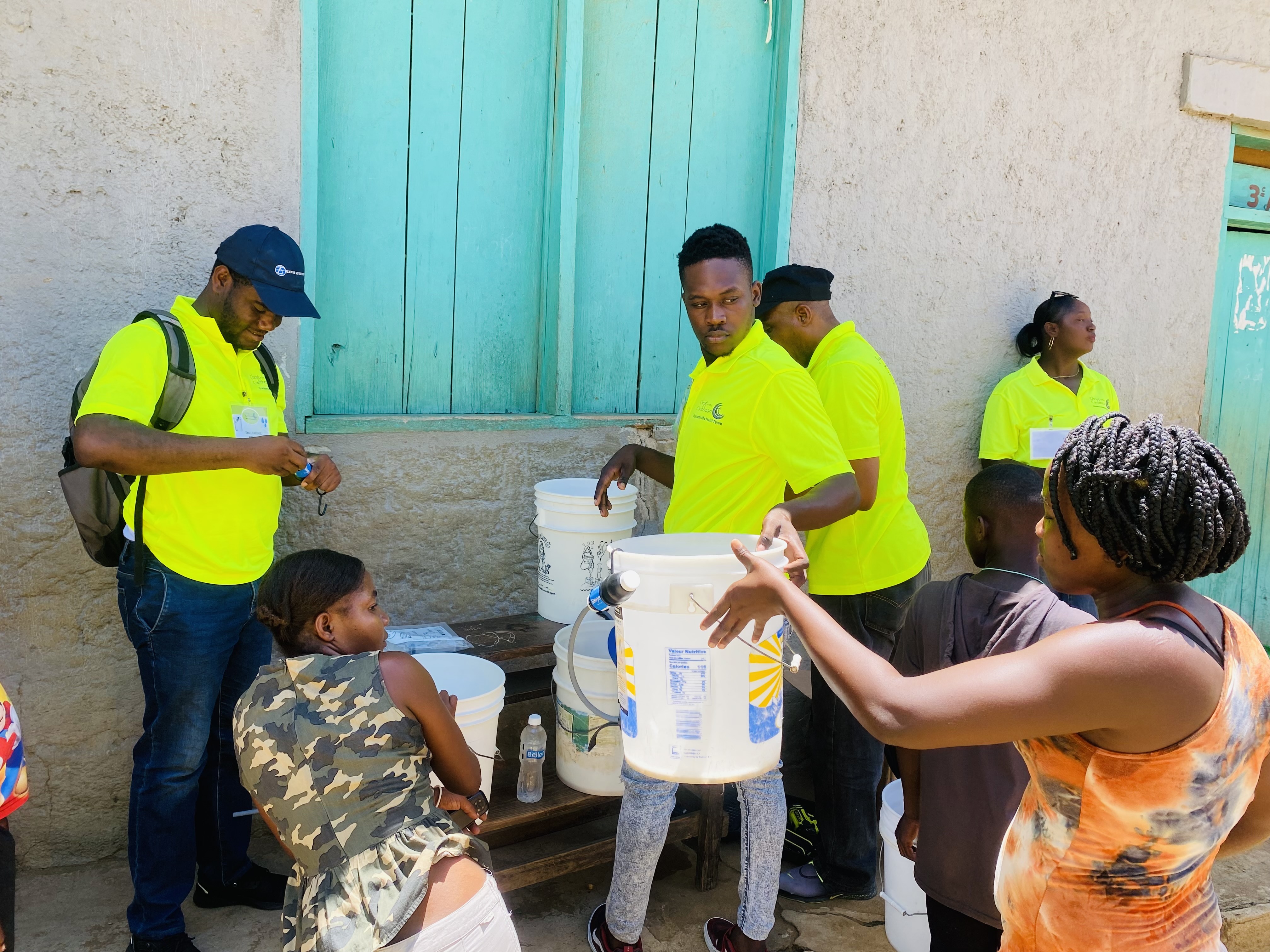 A completed filter is handed back so the owner can go for training