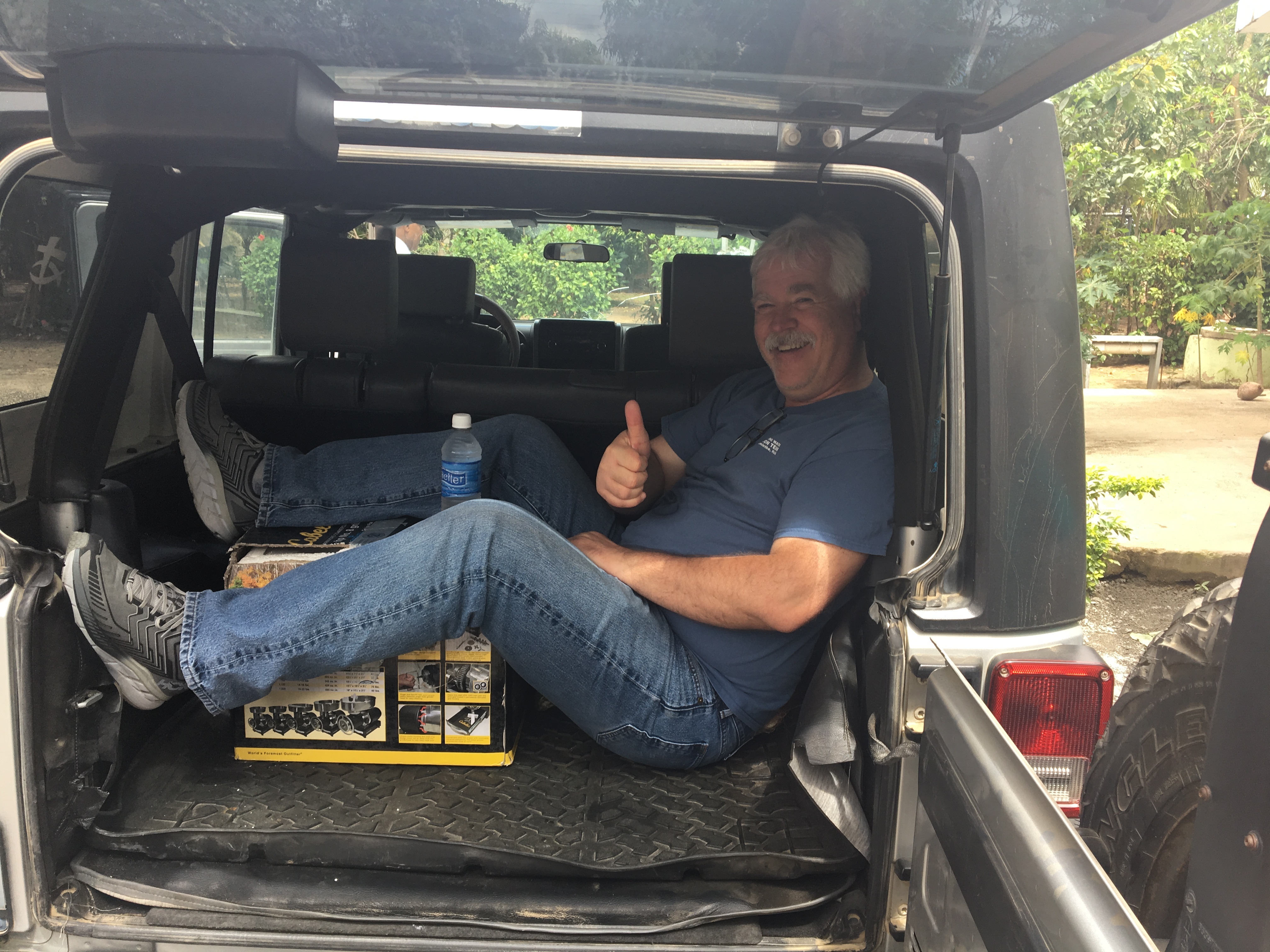 When the volleyball team (national champions in 2011) has a tournament to get to in the bus, we take a ride in anything available. Michael says his seat is all good!